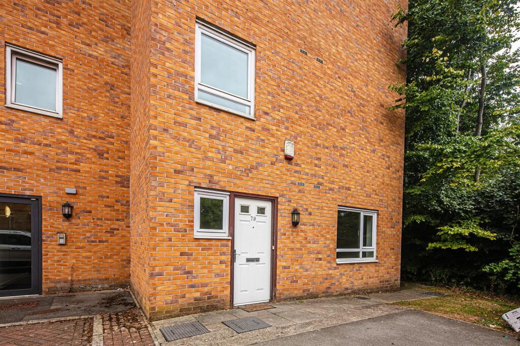 Entrance to flat and parking bay