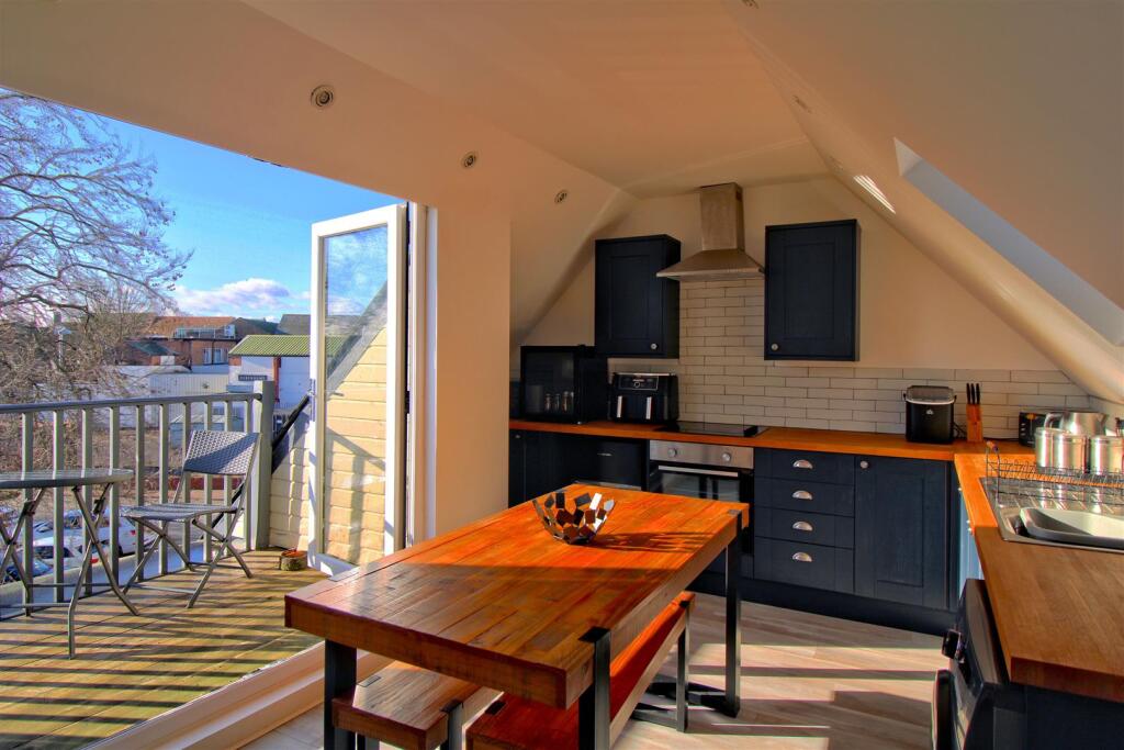 Kitchen overlooking Balcony