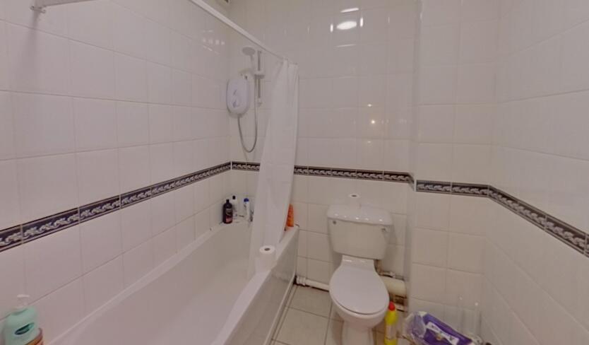 Bright and clean bathroom featuring a full bath...