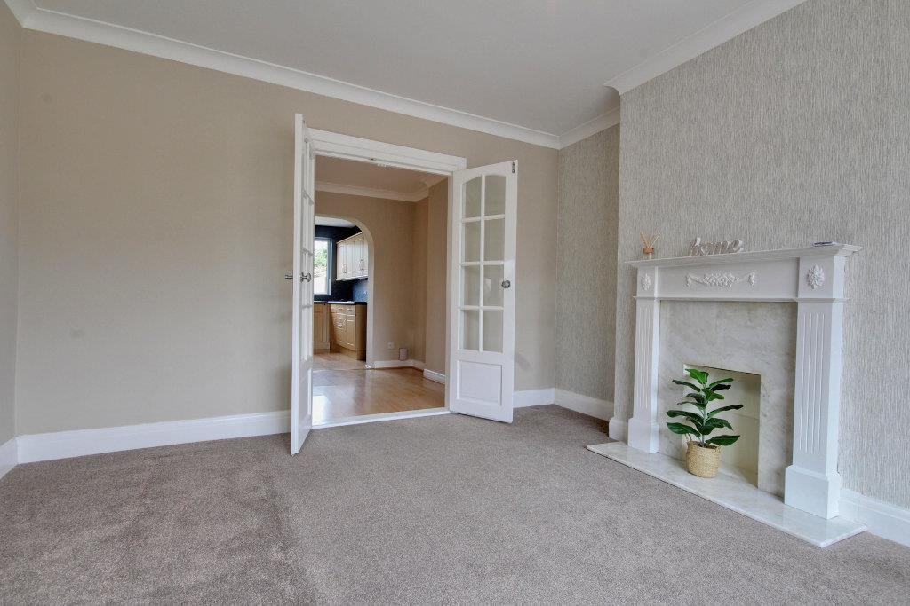 Lounge with doors into Dining Room