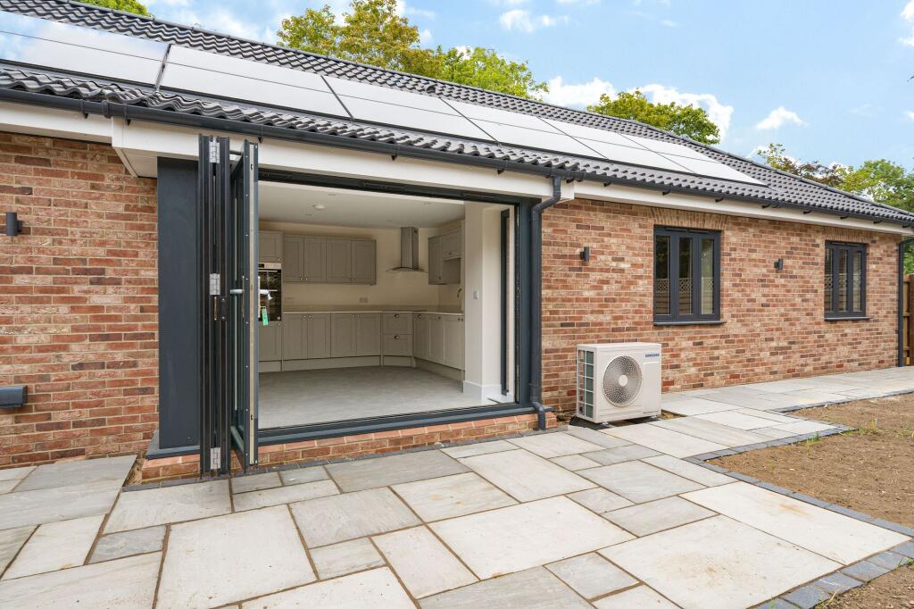 Rear elevation looking into kitchen