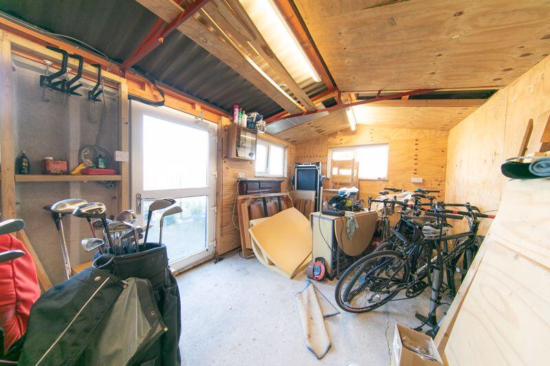 Garage rear storage space