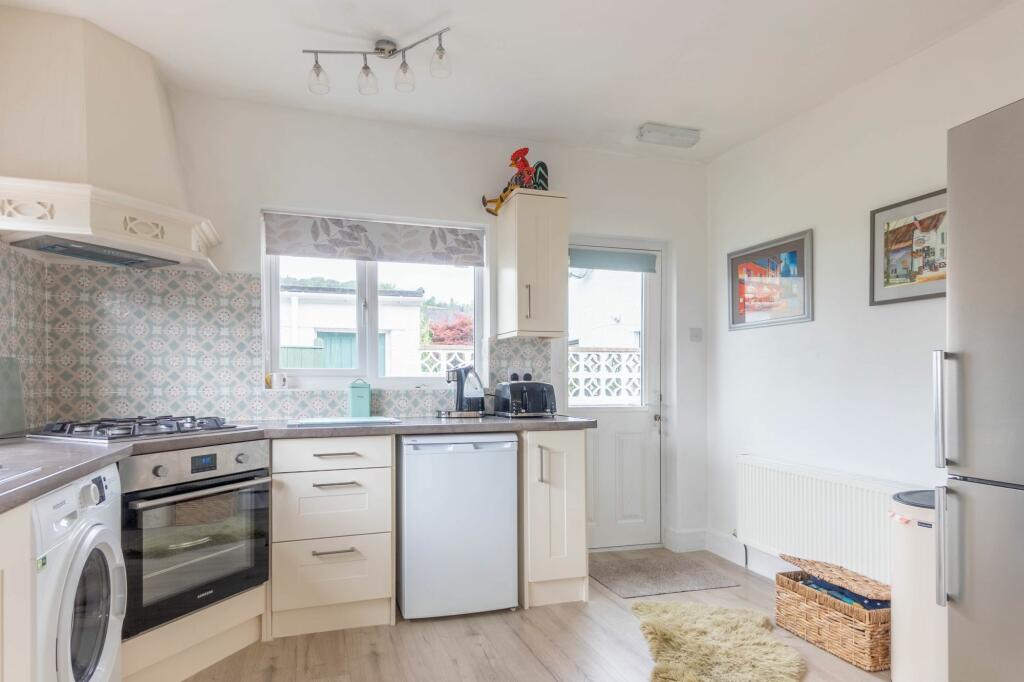 KITCHEN, DINIING AND LIVING SPACE