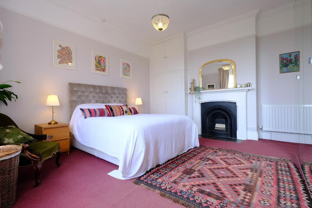 Main bedroom with fireplace