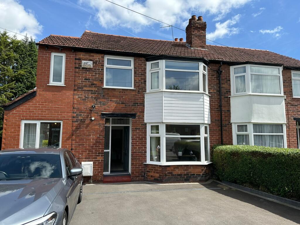 A charming brick-fronted property with a well-m...