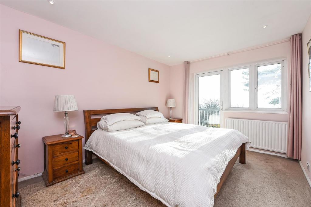 Master Bedroom With Balcony