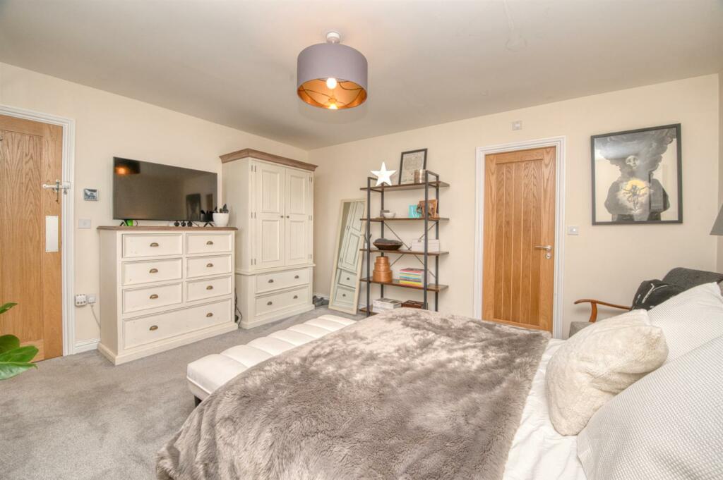 Bedroom One towards landing and en-suite.jpg