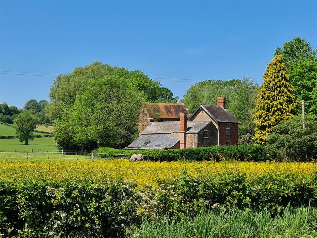 House from roadside across fields.jpg