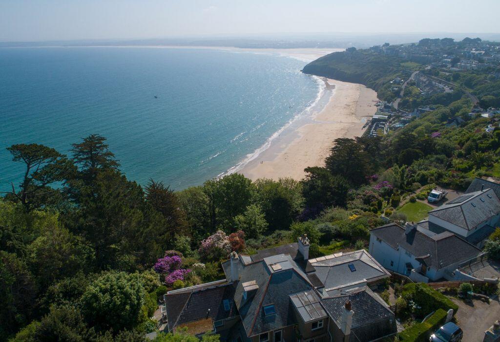Tremorna is buidling on left &amp; Carbis  Bay beach 