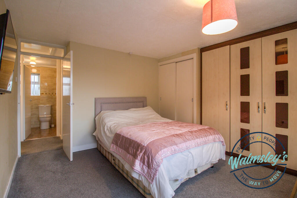 Double bedroom with fitted wardrobes &amp; built in wa