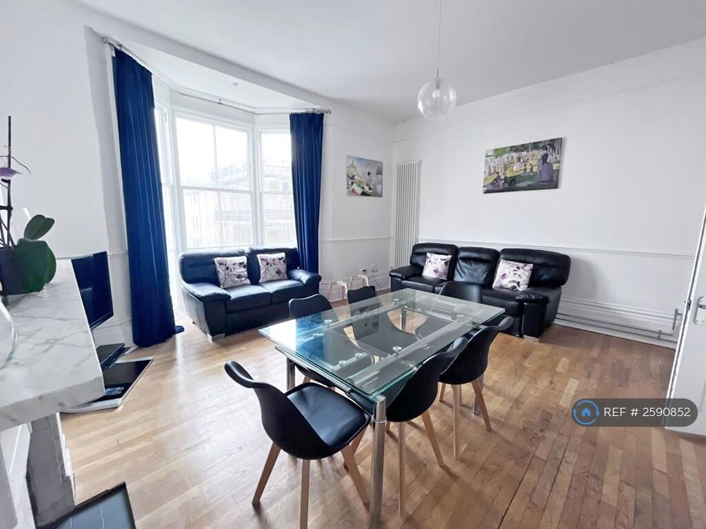 Living Room: Dining Seating For 8, 2 Large Sofas