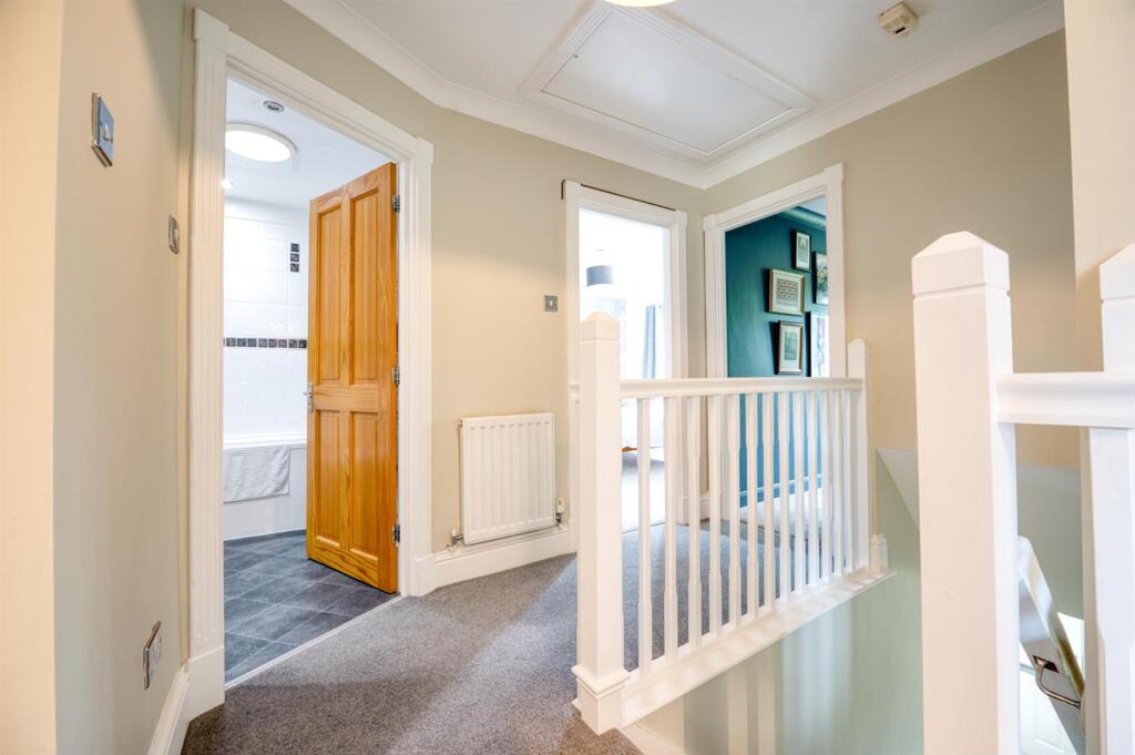 First floor landing to bathroom.jpg