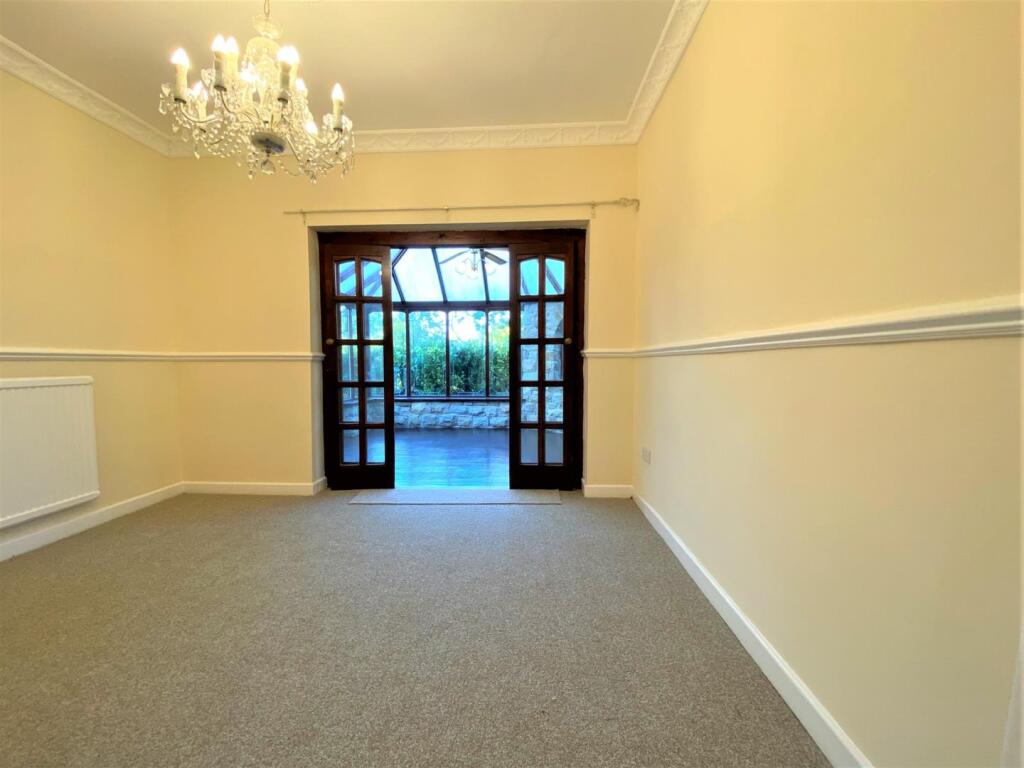 Dining room through to conservatory