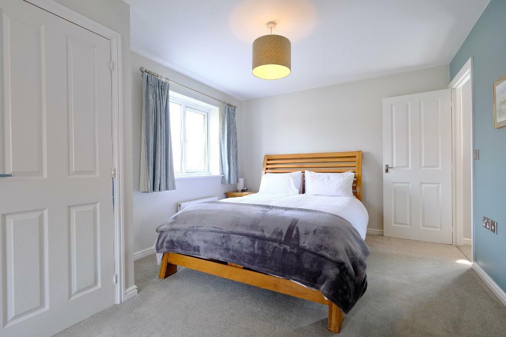 Main bedroom with fitted wardrobes