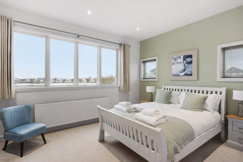 Master bedroom with lake views