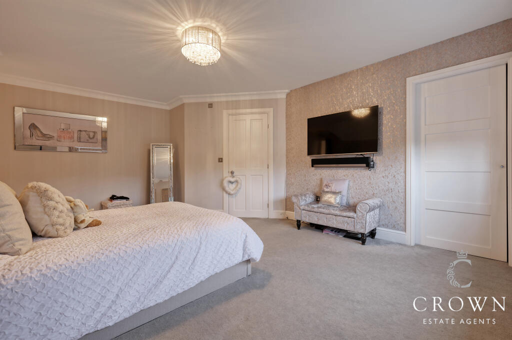 Bedroom Three with en-suite and fitted wardrobe   