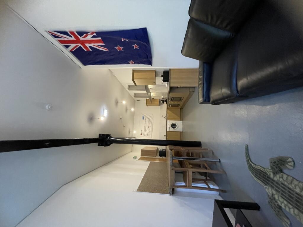 A bright communal lounge featuring comfortable ...