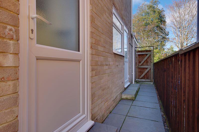 Side Access (Door to Kitchen + Garage)