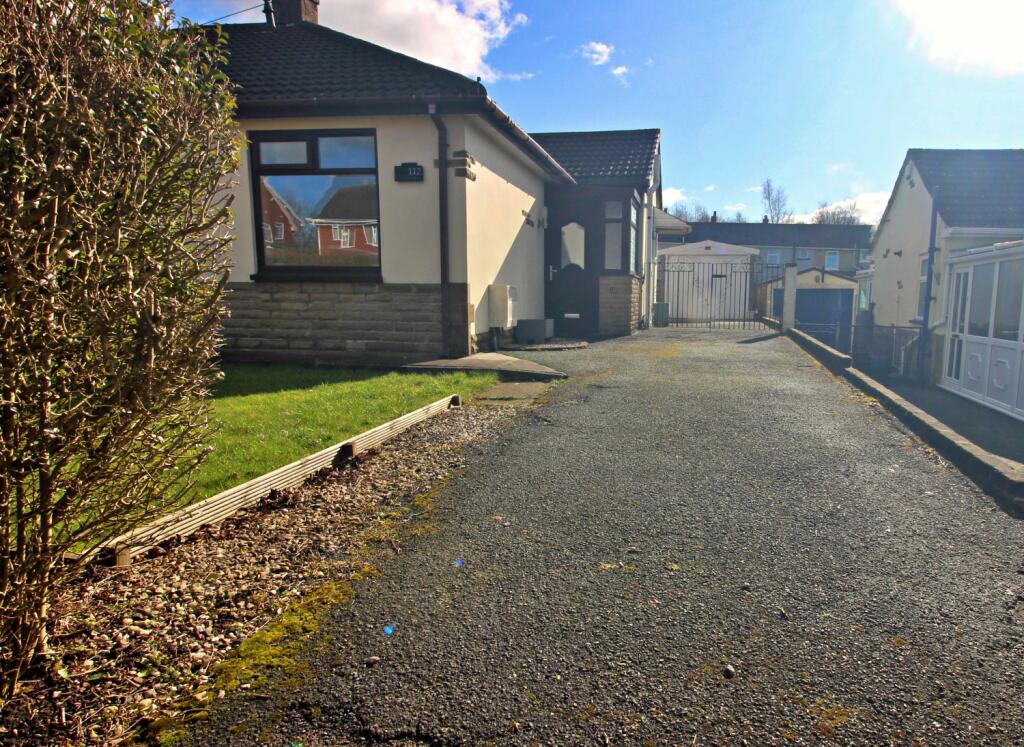 Long Side Drive to Garage