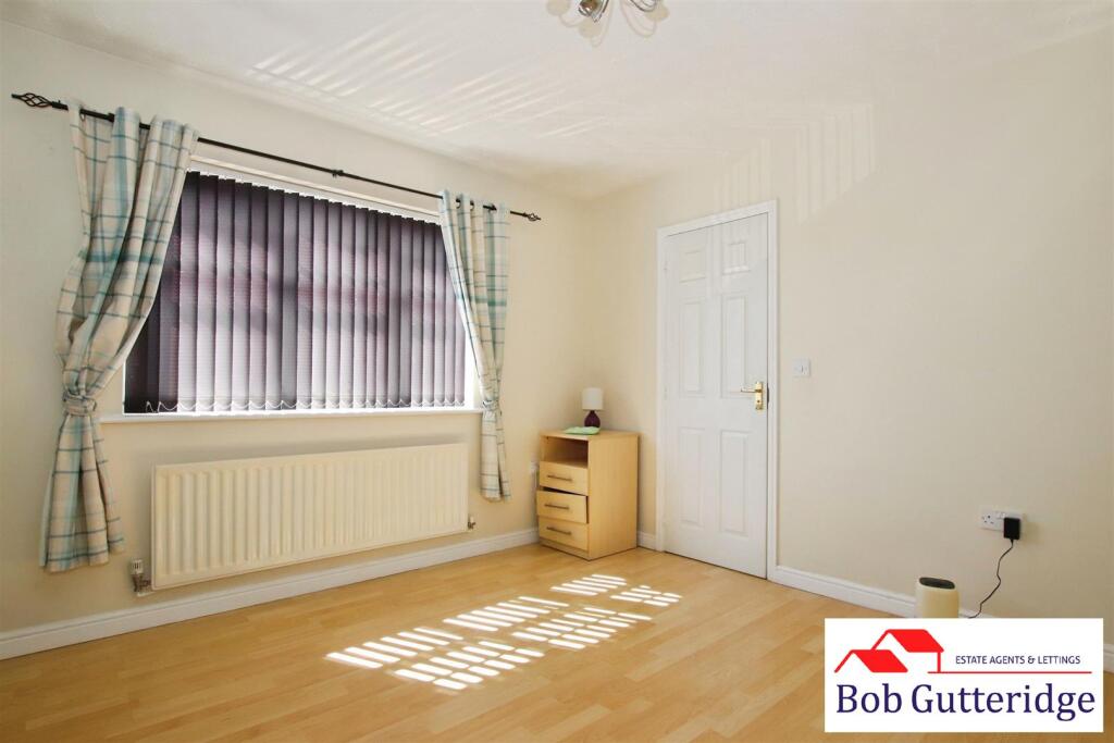 BEDROOM ONE (FRONT)
