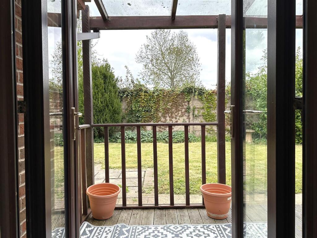 French Doors Onto Seating Canopy 136