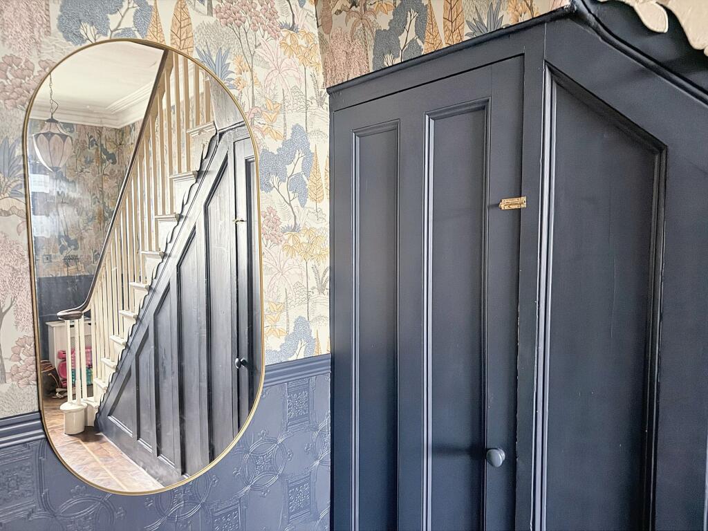 Under Stairs Entrance to Lower Floor