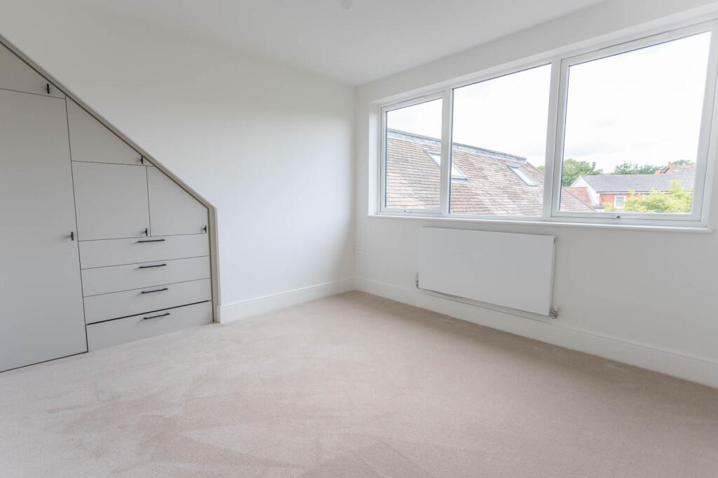 Bedroom with built in wardrobes