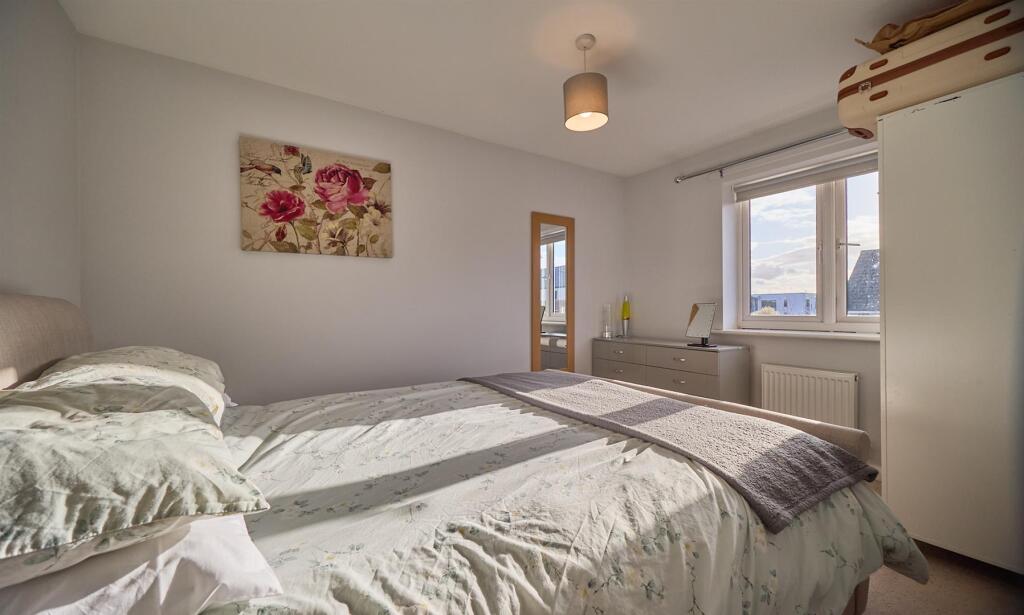 BEDROOM ONE TO REAR