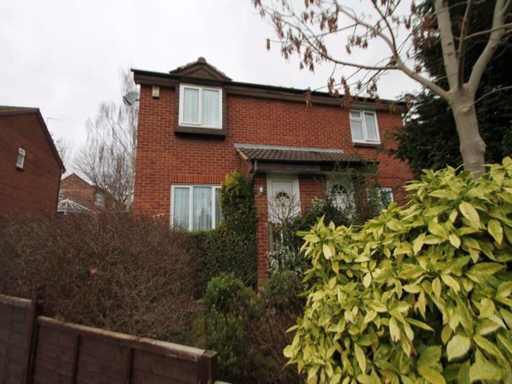 Brick-front semi-detached house with bay window...