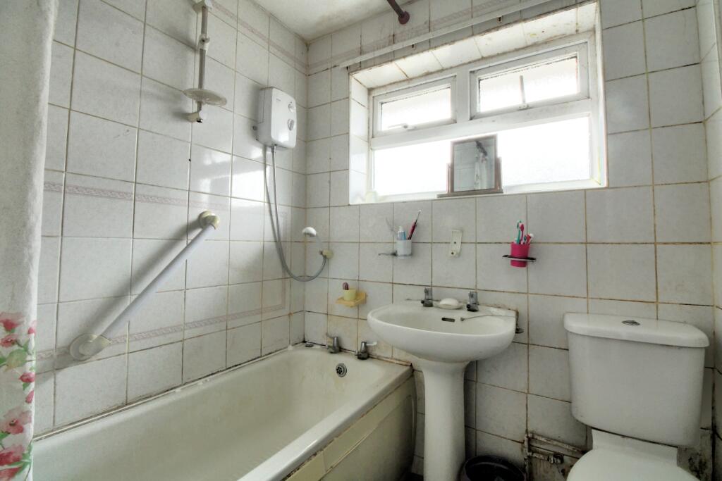 Fully tiled bathroom