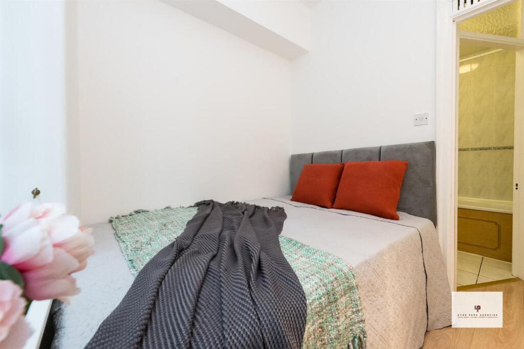 Queen's Court 133-013-013 Logo.jpg