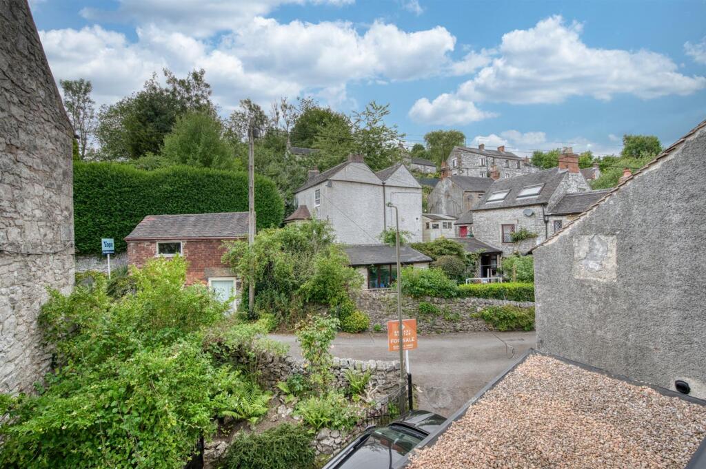 Bedroom One - view to village rooftops behind.jpg