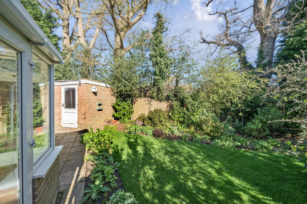 Private rear terrace, side access to garage and rear garden