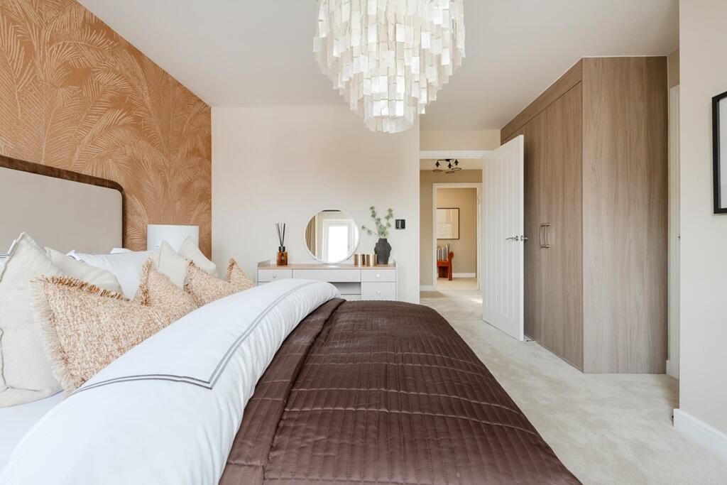 A storage cupboard provides additional space