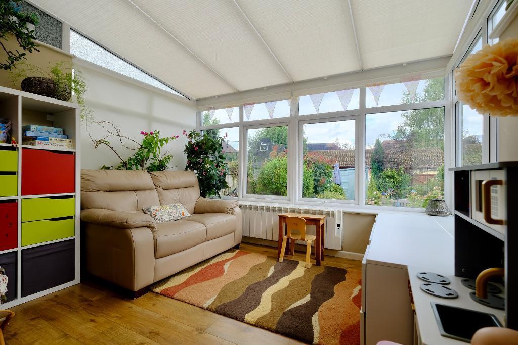 The sun room overlooking the garden