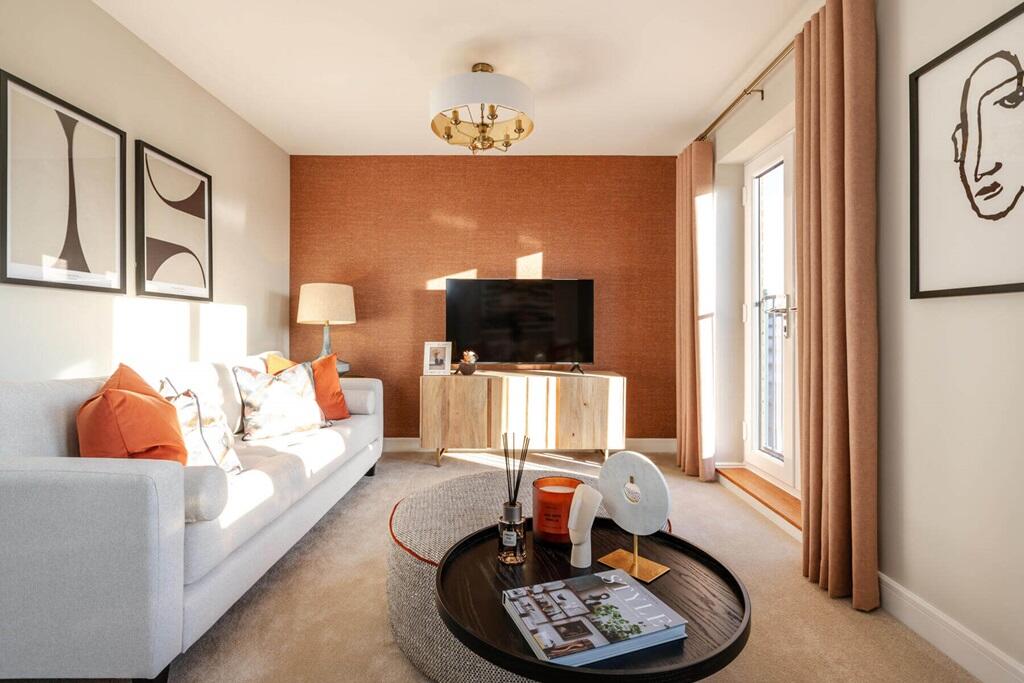 The lounge features a Juliet balcony, perfect in warmer months