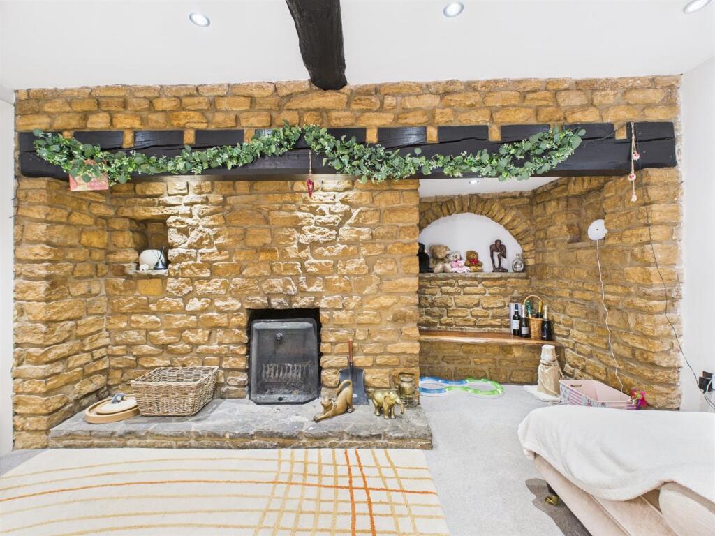 Stone Inglenook with an open fire