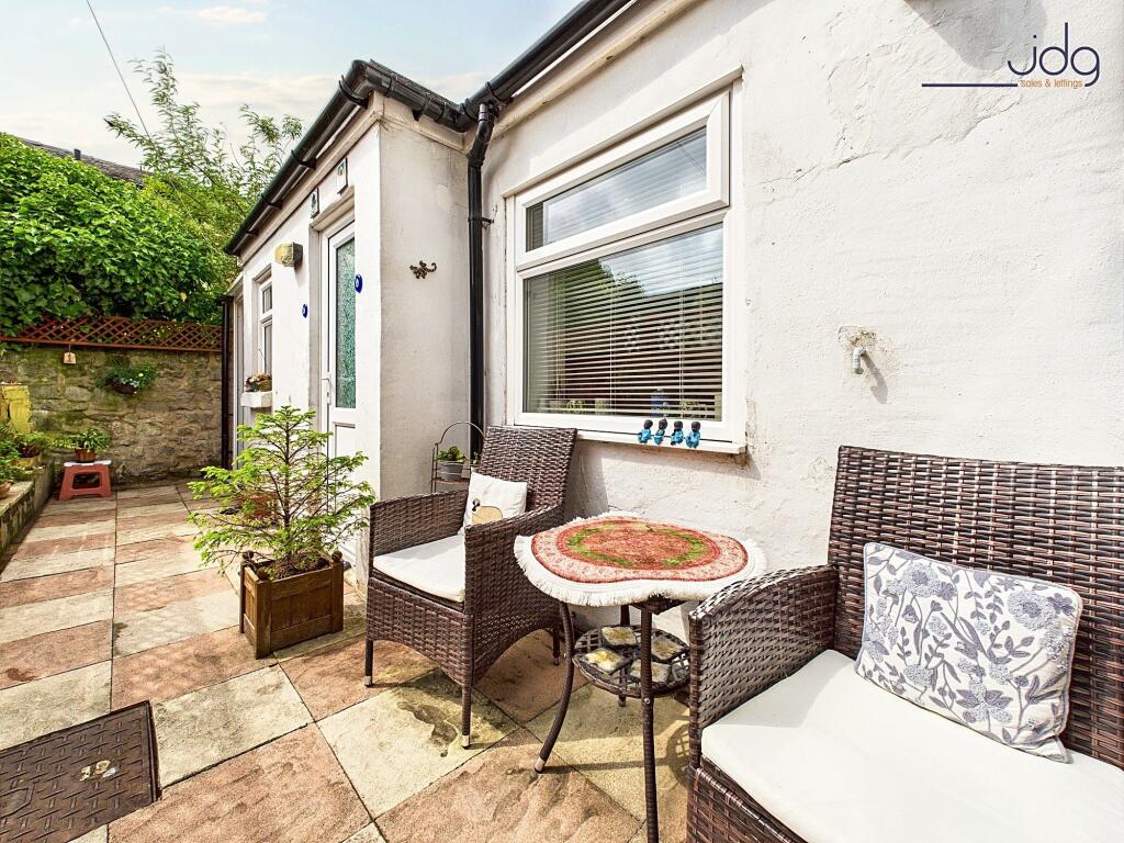 Larger than average yard and an attached outhouse/greenhouse