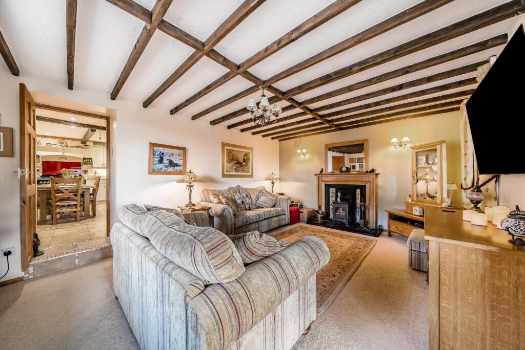 Lounge with entrance to kitchen.jpg