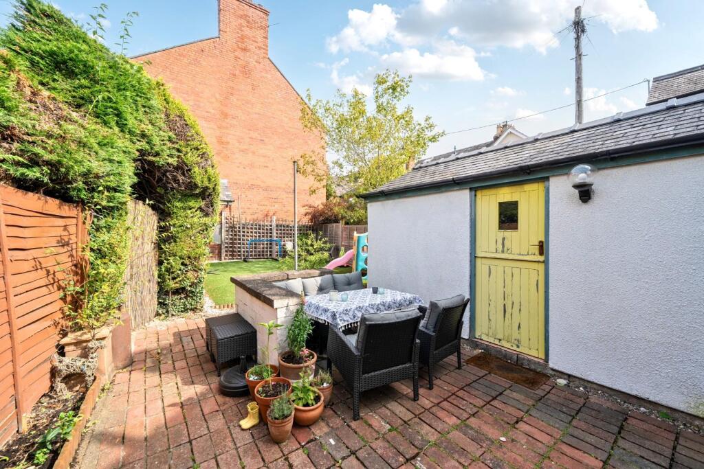 Seating area with outbuilding.jpg