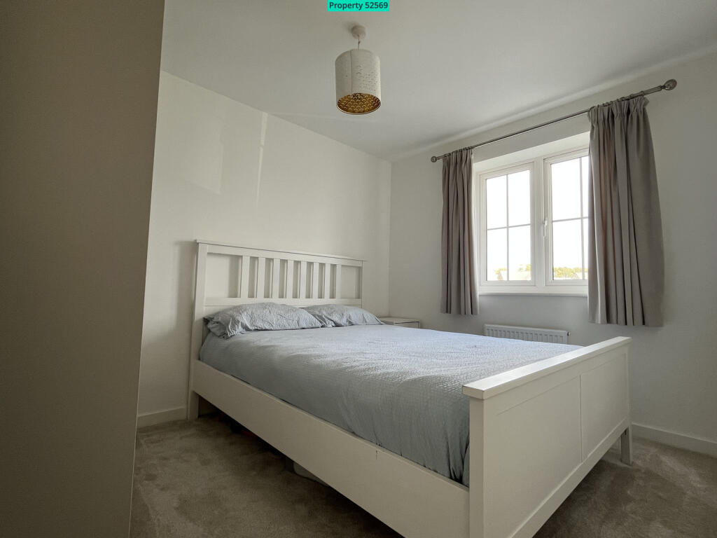 Bedroom 2 with fitted wardrobes 