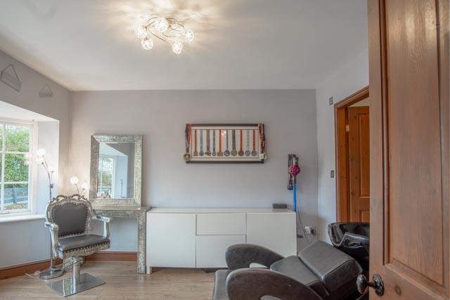 SALON/BEDROOM FIVE