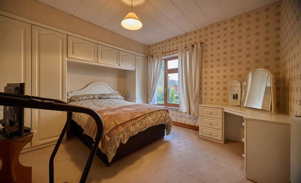 FRONT BEDROOM ONE