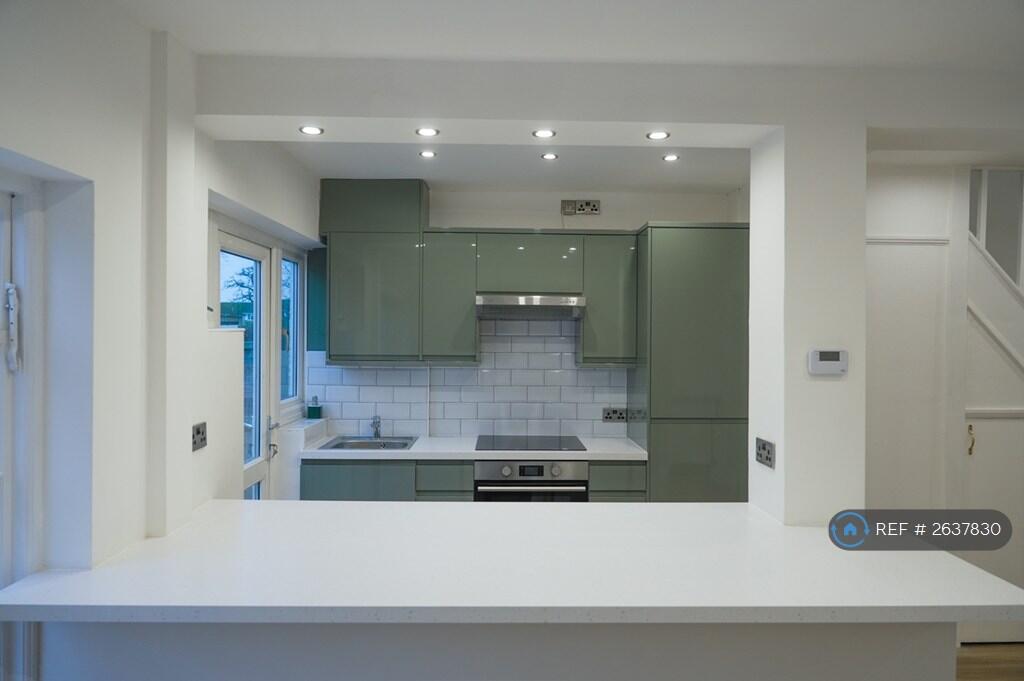 Kitchen From Large Breakfast Bar