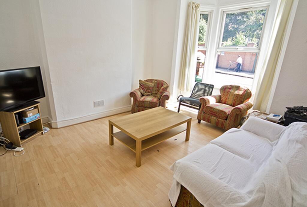 A spacious and inviting large modern living roo...