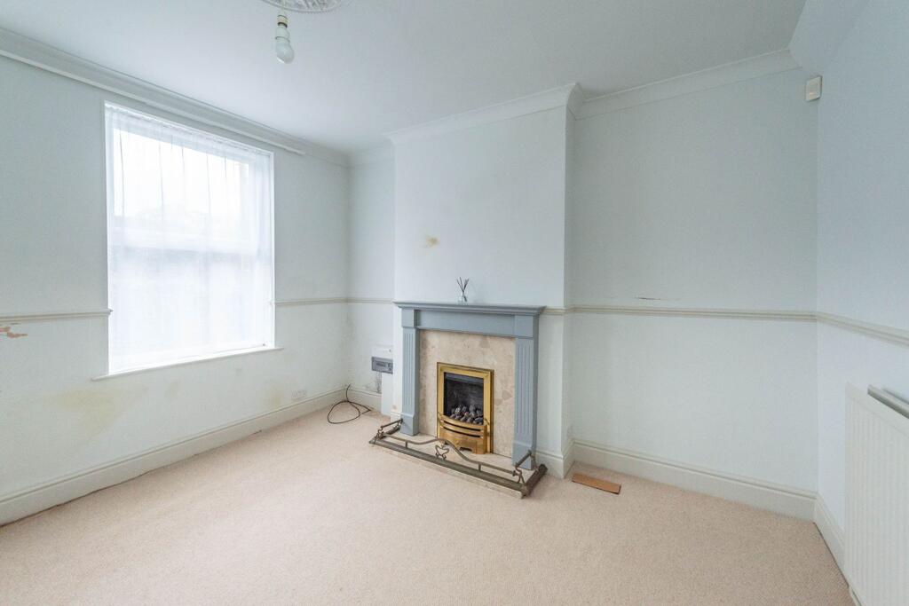 SITTING ROOM AND KITCHEN