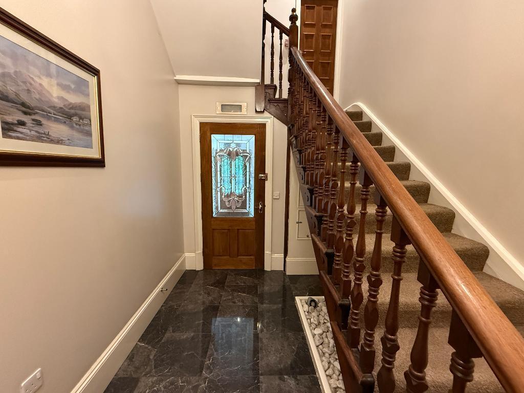 Main entrance door, stairs up to Flat 3
