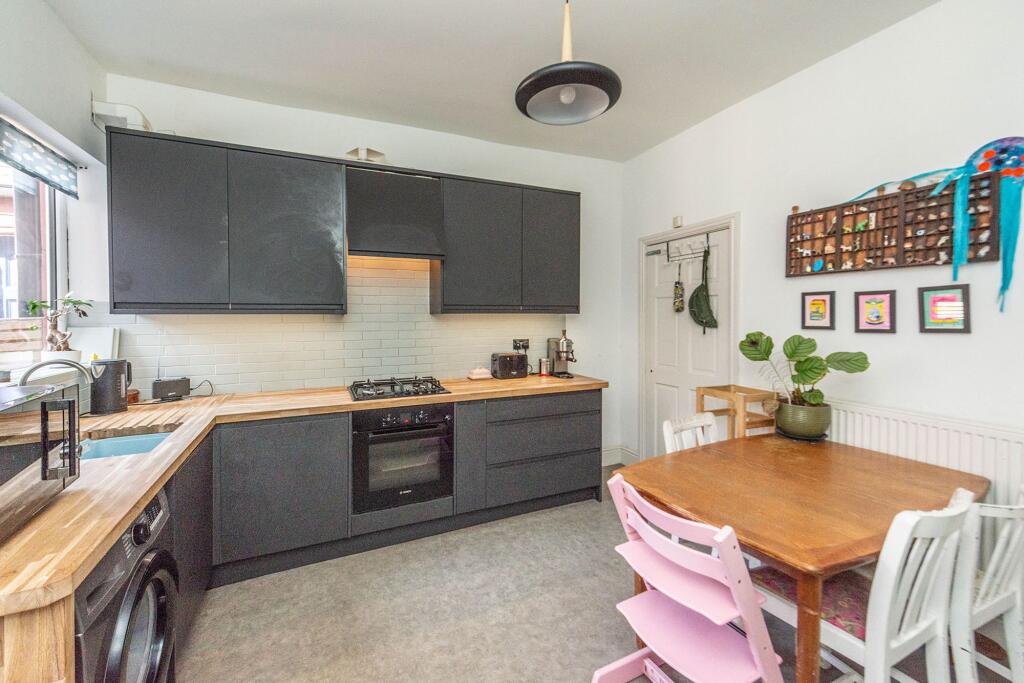 SITTING ROOM AND BEAUTIFUL DINING KITCHEN