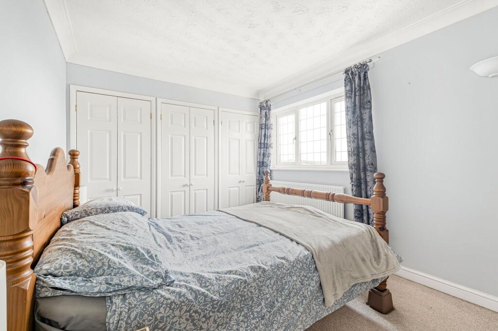 Bedroom with fitted wardrobes