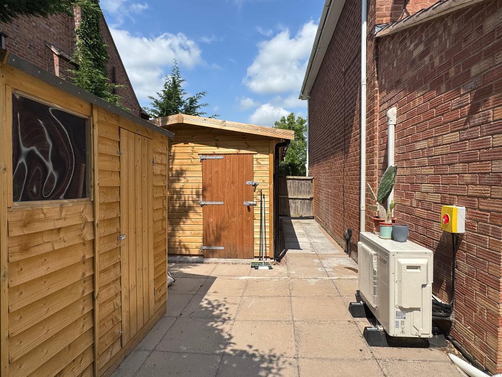 Solid wooden garage and garden shed